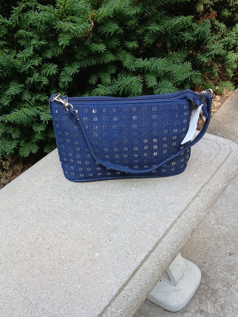 Blue denim shoulder bag adorned with rows of shimmering Sequins